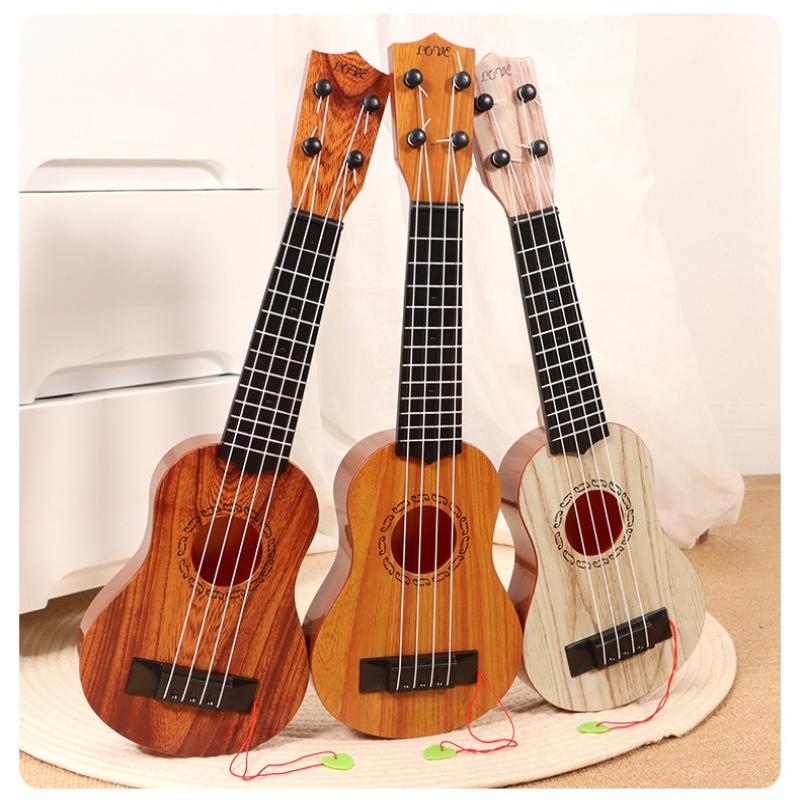 Musical Instrument Names - 1 Stück Lernspielzeug 26/35 cm Kindergitarre