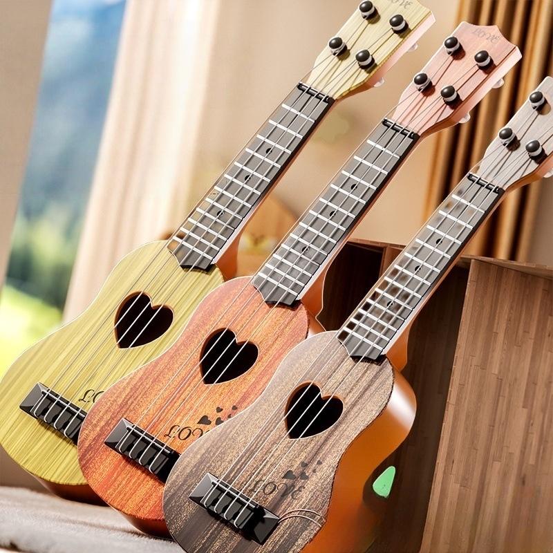 Neu: Gitarrenspielzeug mit Pad – Musical Instrument Names Bewertung und Preis