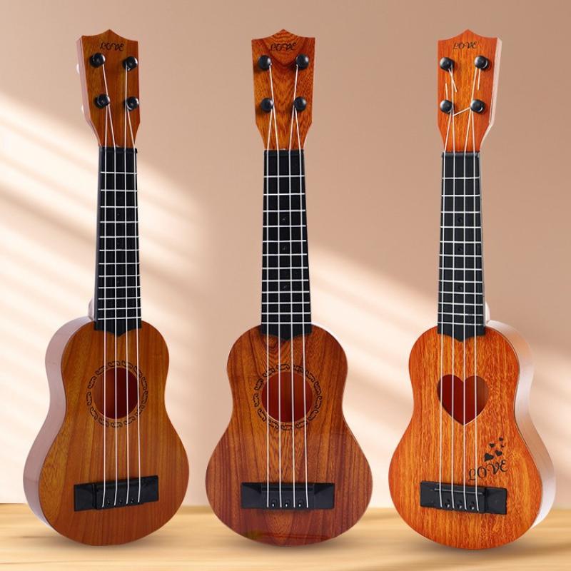 Neu: Gitarrenspielzeug mit Pad – Musical Instrument Names Bewertung und Preis